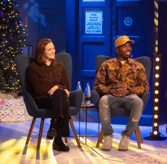 A man and a woman sitting down being interviewed as part of the BBC Outstanding Contribution Awards.