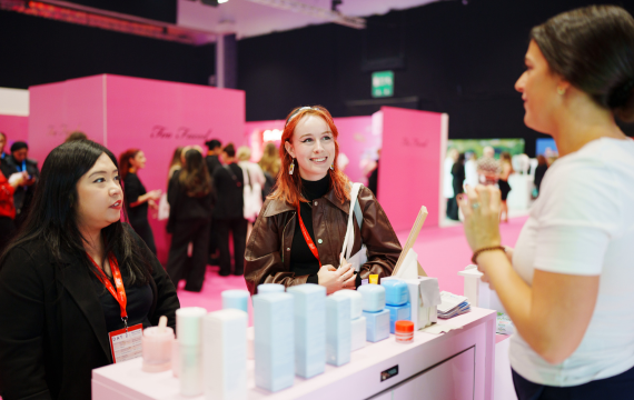 Shot of two people at an expo stand at Boots All Together Beautiful Live