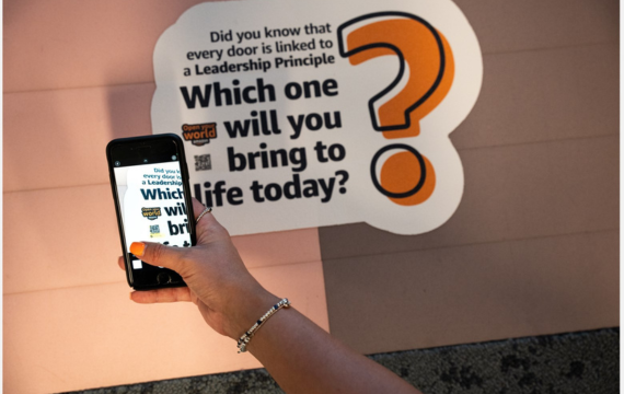 Shot of someone scanning QR code as part of the Amazon Open Your World Campaign