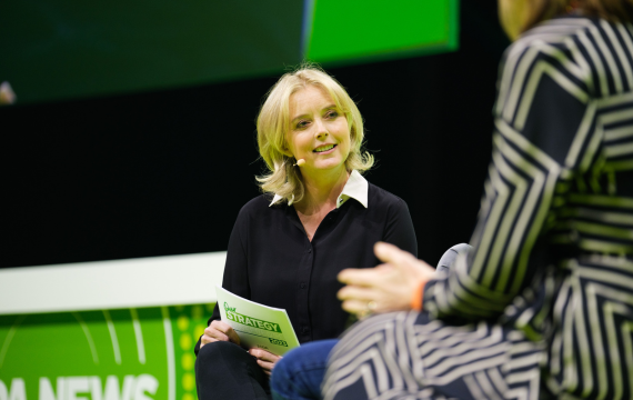 Image of a female talking at the Asda Managers' Conference