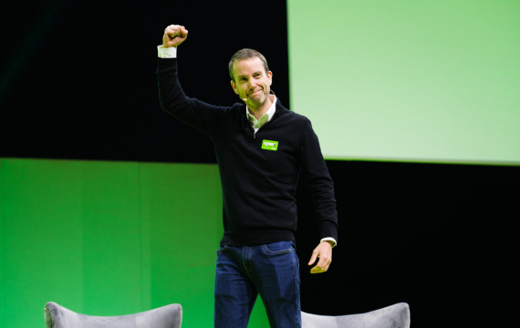 Shot of a male cheering at Asda's Managers' Conference