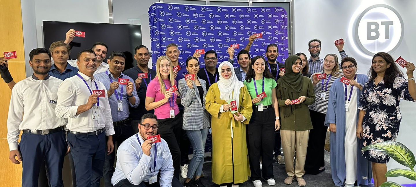 Group shot of people at BT Live holding chocolate bars.