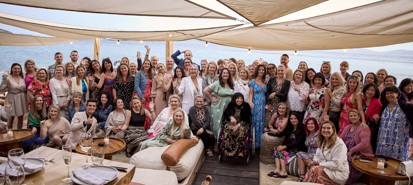 Group shot of Vorwerk at Hippie Fish restaurant during the Mykonos incentive trip.