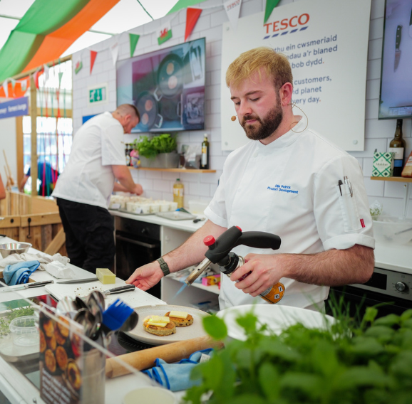 A shot of a chef cooking as part of the Tesco Ag Show.