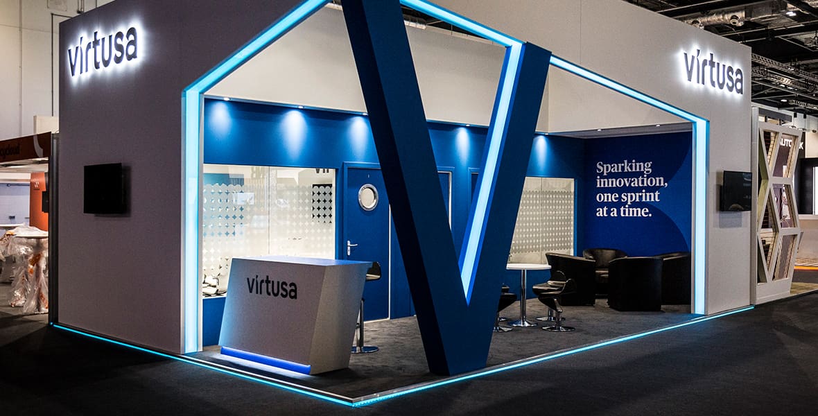 An exhibition stand produced for Virtusa, which includes meeting rooms and open seating